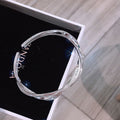 Buy Women's White Copper Silver-Plated Twist Bracelet - Elegant Jewelry